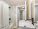 Updated bathroom with a modern vanity and access to hallway at 1510 Mims Sw St, Atlanta, GA 30314