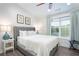 Spacious main bedroom with lake view and comfortable bed at 7104 Lunker Lake Dr # 102, Douglasville, GA 30135