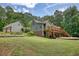 Two-story house with detached garage and expansive yard at 116 Woolsey Creek, Fayetteville, GA 30215