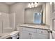 Bathroom boasts granite countertop vanity, shower, and toilet at 256 Eva Way, Cartersville, GA 30121