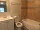 Updated bathroom with tile shower/tub combo at 1650 Bridgeport Nw Dr, Atlanta, GA 30318