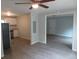 Open concept kitchen and dining area with stainless steel appliances at 1650 Bridgeport Nw Dr, Atlanta, GA 30318
