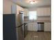 Modern kitchen with granite countertops and stainless steel appliances at 1650 Bridgeport Nw Dr, Atlanta, GA 30318