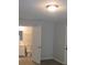 Bright bedroom with vinyl flooring and access to bathroom at 1650 Bridgeport Nw Dr, Atlanta, GA 30318
