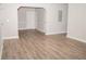 Spacious living room featuring hardwood floors and neutral wall colors at 15 Marissa Cv, Riverdale, GA 30274