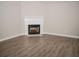 White fireplace in corner of living room at 15 Marissa Cv, Riverdale, GA 30274