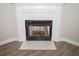Close up of fireplace with wood inside at 15 Marissa Cv, Riverdale, GA 30274