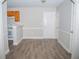 Bright dining area with wood cabinets and hardwood floors at 15 Marissa Cv, Riverdale, GA 30274
