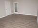 Living room with hardwood floors and access to a patio at 15 Marissa Cv, Riverdale, GA 30274