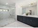 Spa-like Primary bath with marble tile, double vanity, and walk-in shower at 3667 Peachtree Ne Rd # 10, Atlanta, GA 30319