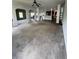 Spacious living room with grey carpet and views into adjacent rooms at 190 Thrushwood Dr, Fayetteville, GA 30215
