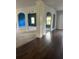 Elegant hallway with hardwood and carpet flooring, leading to other rooms at 190 Thrushwood Dr, Fayetteville, GA 30215