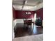 Bright dining room featuring hardwood floors and a chandelier at 190 Thrushwood Dr, Fayetteville, GA 30215