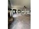 Open concept living room with carpet and a view of the kitchen at 190 Thrushwood Dr, Fayetteville, GA 30215