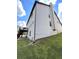 Two-story home with beige siding and a deck at 190 Thrushwood Dr, Fayetteville, GA 30215