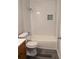 Clean bathroom with white subway tile and wood vanity at 2396 Lawrenceville Hwy # F, Decatur, GA 30033