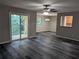 Living room with sliding glass doors to balcony at 2396 Lawrenceville Hwy # F, Decatur, GA 30033
