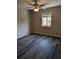 Bright bedroom with ceiling fan and gray vinyl flooring at 2396 Lawrenceville Hwy # F, Decatur, GA 30033