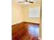 Bright bedroom with hardwood floors and window coverings at 307 Lakemoore Ne Dr # D, Atlanta, GA 30342