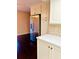 Updated kitchen with white cabinets and stainless steel refrigerator at 307 Lakemoore Ne Dr # D, Atlanta, GA 30342