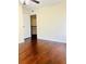 Spacious bedroom with hardwood floors and ceiling fan at 307 Lakemoore Ne Dr # D, Atlanta, GA 30342