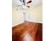 Spacious bedroom with hardwood floors and ceiling fan at 307 Lakemoore Ne Dr # D, Atlanta, GA 30342