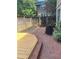 Backyard with brick patio and deck at 307 Lakemoore Ne Dr # D, Atlanta, GA 30342