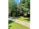 Exterior of building with landscaping and walkway at 307 Lakemoore Ne Dr # D, Atlanta, GA 30342
