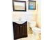 Clean bathroom, featuring a vanity and toilet at 307 Lakemoore Ne Dr # D, Atlanta, GA 30342
