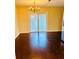 Bright dining room with hardwood floors and chandelier at 307 Lakemoore Ne Dr # D, Atlanta, GA 30342