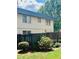 Exterior view of the house, showcasing landscaping at 307 Lakemoore Ne Dr # D, Atlanta, GA 30342