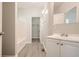 Clean bathroom with a bathtub, vanity, and linen closet at 2259 Sisk Nw St, Atlanta, GA 30318