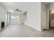 Open living room with hardwood floors, fireplace, and half bathroom at 2259 Sisk Nw St, Atlanta, GA 30318