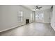 Bright living room with large window, fireplace and ceiling fan at 2259 Sisk Nw St, Atlanta, GA 30318