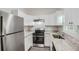 Modern kitchen featuring stainless steel appliances and granite countertops at 2259 Sisk Nw St, Atlanta, GA 30318