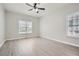 Spacious bedroom with ceiling fan and vinyl flooring at 2259 Sisk Nw St, Atlanta, GA 30318