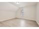 Well-lit bedroom with grey walls and wood-look floors at 2259 Sisk Nw St, Atlanta, GA 30318