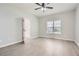 Bright bedroom with vinyl flooring, ceiling fan and exterior access at 2259 Sisk Nw St, Atlanta, GA 30318