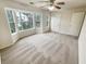 Spacious bedroom with neutral carpeting, bay window, and ample natural light at 5319 Pinnacle Peak Ln, Norcross, GA 30071