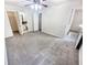 Spacious bedroom with carpeting, ceiling fan, and en-suite bathroom at 5319 Pinnacle Peak Ln, Norcross, GA 30071