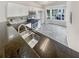 Modern kitchen featuring granite countertops and stainless steel sink at 5319 Pinnacle Peak Ln, Norcross, GA 30071