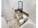 Bathroom with granite vanity, tile flooring, and a bathtub at 5319 Pinnacle Peak Ln, Norcross, GA 30071