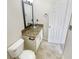 Bathroom features granite countertops, glass vessel sink, and tiled flooring at 5319 Pinnacle Peak Ln, Norcross, GA 30071
