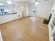 Large living room with hardwood floors and a fireplace at 5319 Pinnacle Peak Ln, Norcross, GA 30071