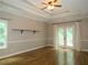 Spacious main bedroom with hardwood floors and a ceiling fan at 1269 Heritage Dr, Villa Rica, GA 30180