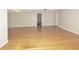 Spacious basement with hardwood floors and neutral walls at 1269 Heritage Dr, Villa Rica, GA 30180
