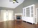 Spacious living room with hardwood floors, fireplace, and built-in shelving at 1269 Heritage Dr, Villa Rica, GA 30180