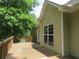 Home exterior with light beige siding and a wooden deck at 1269 Heritage Dr, Villa Rica, GA 30180