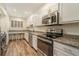 Modern kitchen with stainless steel appliances at 3630 Stonewall Se Dr, Atlanta, GA 30339