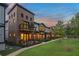Townhomes with grassy lawn and a brick facade at 945 Willingham Dr # 3, Hapeville, GA 30354